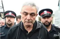  ?? NATHAN DENETTE/THE CANADIAN PRESS ?? A man believed to be Vahe Minassian, the suspect’s father, attends Alek Minassian’s first court appearance on Tuesday.