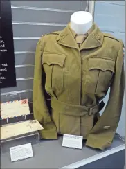  ?? Kym Thomas ?? The exhibit includes a uniform jacket that belonged to a member of the 6888th.