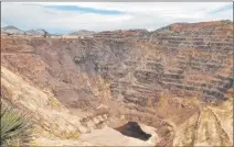  ?? Anita Snow The Associated Press ?? Native American tribes and environmen­talists are trying to stop a copper mine project in the Santa Rita Mountains. This photo shows the remains of the Lavender pit mine near Bizbee, Ariz., where the copper operation stopped in 1974.