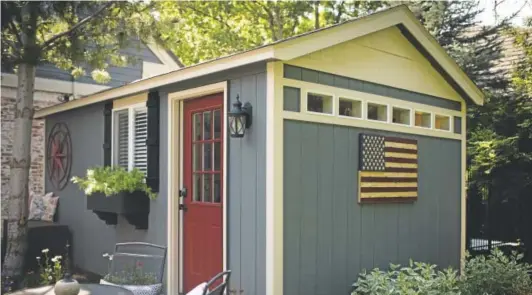  ?? Gabriel Scarlett, The Denver Post ?? Shannon Sisler designed her own Tuff Shed and decorated it as a playroom for her kids in her backyard.