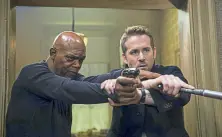  ?? Jack English, Lionsgate ?? Samuel L. Jackson, left, and Ryan Reynolds in “The Hitman’s Bodyguard.”