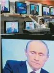  ?? Foto: dpa ?? Das Moskauer Staatsfern­sehen präsen tiert Putin als starken Führer.