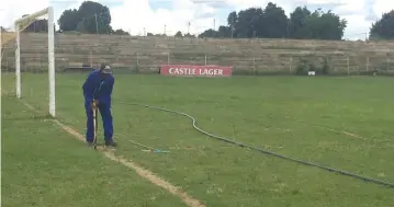  ?? ?? A Rusape Town Council employee attends to the turf at Vengere Stadium early this week