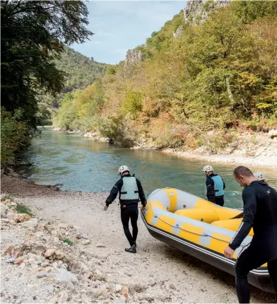  ?? ?? Right: Preparing to enter the water for some river rafting in Konji