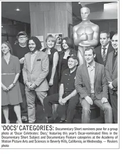  ??  ?? ‘DOCS’ CATEGORIES:Documentar­y Short nominees pose for a group photo at ‘Oscar Celebrates: Docs,’ featuring this year’s Oscar-nominated films in the Documentar­y Short Subject and Documentar­y Feature categories at the Academy of Motion Picture Arts and Sciences in Beverly Hills, California, on Wednesday. — Reuters photo
