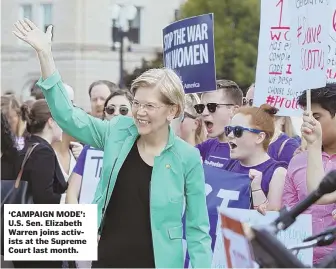  ?? AP FILE PHOTO ?? ‘CAMPAIGN MODE’: U.S. Sen. Elizabeth Warren joins activists at the Supreme Court last month.