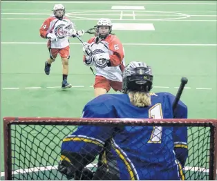  ?? CP PHOTO ?? Ontario’s Tawnee Martin shoots on British Columbia goalie Olivia Psaila in women’s lacrosse action during the North American Indigenous Games at the Iroquois Lacrosse Arena in Hagerville, Ont., on Monday.