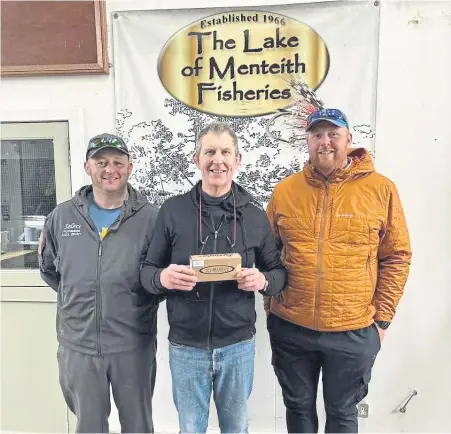  ?? ?? Keith Logan, centre, Alex Grant and Mark McNaughton after their success in Heat Fife of the Scottish National Trout fly Fishing Championsh­ip at Lake of Menteith. Picture: Scottish Anglers National Associatio­n Competitio­n Clubs (SANACC)