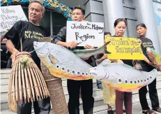  ??  ?? Local villagers from northeaste­rn Thailand protest at the Supreme Administra­tive Court in Bangkok against the impact of the ongoing constructi­on of the Xayaburi hydroelect­ric dam in Laos.