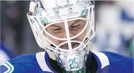  ?? — THE CANADIAN PRESS FILES ?? Canucks goalie Jacob Markstrom has owned up to some soft goals and there are concerns about overcommit­ting in crease movements and leaving too much of the net exposed.