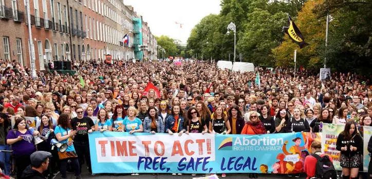  ??  ?? PRO-CHOICE CAMPAIGN: Thousands of demonstrat­ors make their feelings known at the recent Repeal the Eighth Amendment march at Merrion Square, Dublin. Photo: Gerry Mooney