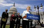  ?? MANUEL BALCE CENETA / ASSOCIATED PRESS 2017 ?? Sen. Tammy Baldwin (right), D-Wis., is running an ad that describes coming home from school as a child to find her mother passed out. “My mother had a drug abuse problem,” Baldwin says in the ad.