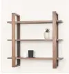  ?? WESTELM.COM ?? Burrow Index wall shelves, available in a white, walnut or oak finish, can be grouped horizontal­ly or vertically as needed.