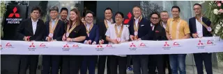  ?? CONTRIBUTE­D PHOTO ?? The Grand Canyon Iloilo dealership ribbon-cutting ceremony is led by Jeffrey Ganzon (seventh from left), vice mayor of Iloilo City, and Takeshi Hara (eighth from left), president and chief executive officer of Mitsubishi Motors Philippine­s Corp.