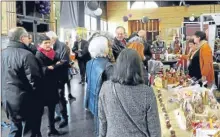  ??  ?? Les élus et représenta­nts de l’etat au stand bien local de Romane D