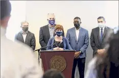  ?? Will Waldron / Times Union ?? Albany Mayor Kathy Sheehan is joined Tuesday by city officials and housing advocates as she unveiled new fair housing legislatio­n that will be introduced to the Albany Common Council.