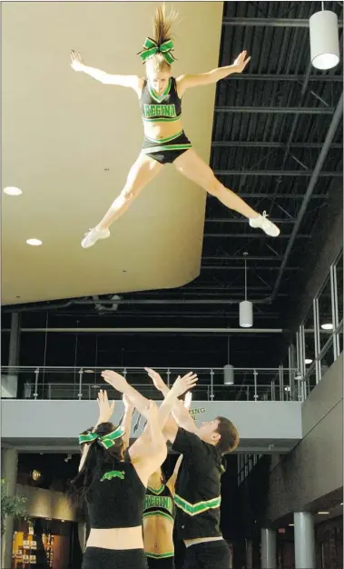  ?? MICHAEL Bell/leader-post ?? The University of Regina cheerleadi­ng team displays one of its moves on Saturday.