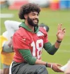  ?? MILWAUKEE JOURNAL SENTINEL ?? Rookie quarterbac­k Manny Wilkins has shown zip on the football, as well as accuracy and an ability to move around the pocket early in training camp.
