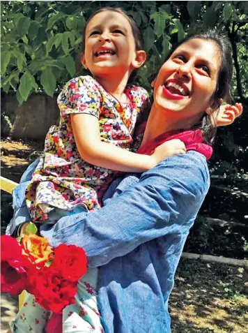  ??  ?? Nazanin Zaghari-ratcliffe is reunited with her daughter Gabriella, now four