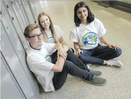  ?? SHAUGHN BUTTS ?? From left, Zachary Flynn, Grade 12 at Eastglen, Astrid Krueger, Grade 12 at McNally, and Farzeen Ather, Grade 11 at J. Percy Page High School, were among the participan­ts at a full-day mental health conference for students Monday at Strathcona High School called Stepping Forward Together.