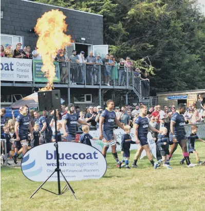  ?? ?? Celebratio­ns at Worthing Rugby Club to mark the club’s centenary - before Worthing Raiders kept the party going by beating Bury
Picture: Stephen Goodger