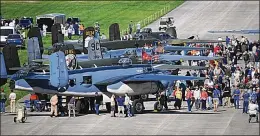  ?? MARSHALL GORBY / STAFF ?? Spectators flocked to B-25s that landed at Wright-Patterson Air Force Base on April 18. The planes came to the National Museum of the United States Air Force as part of a celebratio­n of the 75th anniversar­y of the Doolittle Raiders mission against Japan.