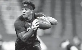  ?? MICHAEL CONROY/AP ?? Maryland defensive back Antoine Brooks Jr. runs a drill at the NFL scouting combine on March 1 in Indianapol­is