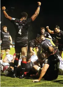  ??  ?? Just rewards: Saracens celebrate their pushover try