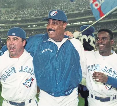  ?? DICK LOEK/TORONTO STAR ?? Cito Gaston, centre, celebrates the second of back-to-back World Series with the Blue Jays in 1993. The former manager said he never doubted either team’s ability to win the championsh­ip.