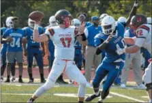  ?? GENE WALSH — DIGITAL FIRST MEDIA ?? Upper Dublin quarterbac­k Mike Slivka prepares to throw Friday night.