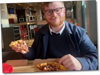  ?? ?? Our reviewer Sean McPolin digs into his pizza