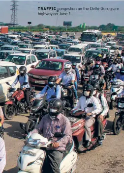  ??  ?? TRAFFIC congestion on the Delhi-gurugram highway on June 1.