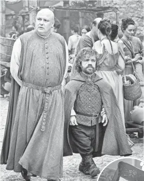  ?? PHOTOS BY HBO ?? Lord Varys (Conleth Hill, left) and Tyrion Lannister (Peter Dinklage) are two of the wittiest characters on Game of Thrones.