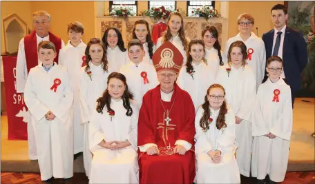  ??  ?? Kiskeam National School pupils pictured with Bishop Ray Browne, Fr. Jim Kennelly PP, and their teacher Eugene Kelleher on their Confirmati­on day in the Church of the Sacred Heart, Kiskeam.