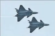  ?? REUTERS ?? J20 stealth fighter jets perform with open weapon bays during the Zhuhai Airshow in Guangdong province on Sunday.