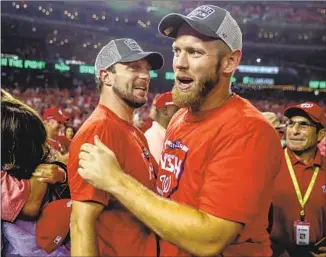  ?? Andrew Harnik Associated Press ?? WASHINGTON IS EXPECTED to go with right-handers Max Scherzer, left, and Stephen Strasburg to start the first two games of the World Series, but the order has not been announced.