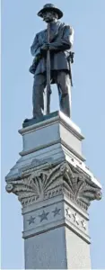  ?? AP FILE PHOTO BY GERRY BROOME ?? A monument honors the Confederat­e dead at the state Capitol in Raleigh, N.C.