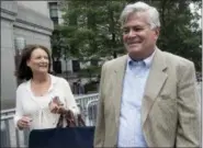  ?? AP PHOTO/MARY ALTAFFER ?? Former New York Senate leader Dean Skelos, right, and his wife, Gail, leave federal court Friday in New York. Skelos took the witness stand at his corruption trial on Friday, telling jurors that he used his connection­s to try to get his...