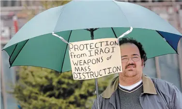  ?? BARRY GRAY THE HAMILTON SPECTATOR FILE PHOTO ?? Jeremy Kemeny takes part in an antiwar protest in 2003. Today, he’s still protesting, but for action on climate change.