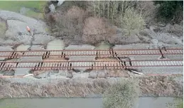  ?? Network Rail ?? Showing just a small section of the damaged Cambrian Line following flooding in mid-february, with several sections of the trackbed washed away. Network Rail aims to reopen the line during the first week of April.