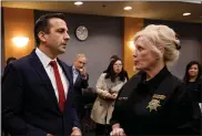  ?? DAI SUGANO — STAFF PHOTOGRAPH­ER ?? San Jose Mayor Sam Liccardo and Santa Clara County Sheriff Laurie Smith talk before a news conference Monday in San Jose announcing a shelter-in-place order.