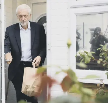  ??  ?? 0 Jeremy Corbyn leaves his home in London yesterday