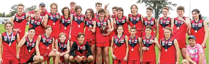  ?? ?? The Western Gippsland under 15s premiershi­p side.
Back: Riley Senini, Jarrod West, Nic Fogarty (assistant coach) Charlie Townley, Xavier Olsson, George Morgan (coach), Tom Cornwall, Logan Joyce, Tom Mapleson, Levi Moore (captain), Sam Grummisch, Kyson Cornwall, Clancy Pope, Ewan Croucher, Max Williames, Noa Fogarty, Kai Mounsey, Tom Vickery.
Front: Brodie Atkins, Josh Bradley, Joel Armstrong, Caleb McIntosh, Ollie Wilson, Tommy Logan, Luke Briganti, Noah McDonald, Regan Awty, Glenn Awty (runner).