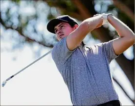  ?? Mark J. Terrill / Associated Press ?? Davis Thompson hits from the sixth tee at the American Express. After five eagles in the first two rounds, he shot an eagle-free 67 on Saturday.