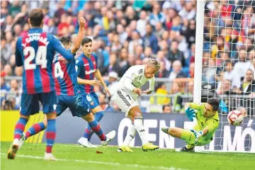  ?? — AFP photo ?? Real Madrid’s Spanish-Dominican forward Mariano scores, but the goal was annulled, during the Spanish league football match Real Madrid CF against Levante UD at the Santiago Bernabeu stadium in Madrid on October 20, 2018.