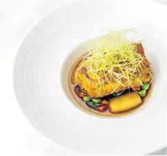  ??  ?? Morue Charbonnie­re, shoyu-glazed sablefish, by chef David Pan of Origo Club.