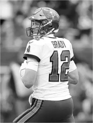  ?? MARK LOMOGLIO PHOTOS/AP ?? Quarterbac­k Tom Brady, looking for a receiver during the second half vs. Philadelph­ia last week, will turn 45 in August and has one year remaining on his contract.