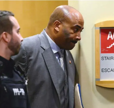  ?? SEAN KILPATRICK/THE CANADIAN PRESS ?? Don Meredith leaves a Senate committee in on April 4, when he was still adamantly maintainin­g he shouldn’t lose his Senate position.