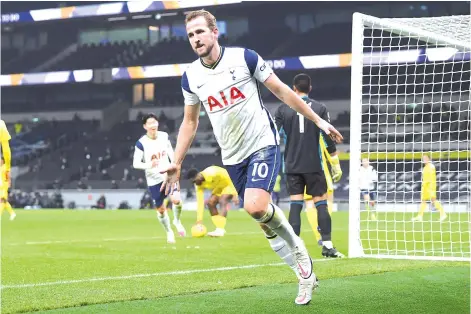  ?? - AFP photo ?? Tottenham Hotspur's English striker Harry Kane celebrates scoring his team's first goal against Fulham at Tottenham Hotspur Stadium in London.