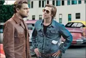  ?? Sony Pictures ?? LEONARDO DiCAPRIO, left, and Brad Pitt costar as an aging actor and his stunt double, respective­ly.